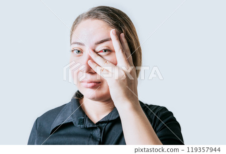 Person with irritated eyes. People with eye pain isolated. woman with conjunctivitis on white background. Close up of girl with eye strain 119357944
