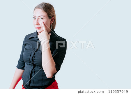 Distrustful girl looking at you. Distrustful beautiful girl looking at you with suspicion Distrustful girl looking at you. Distrustful beautiful girl looking at you with suspicion 119357949