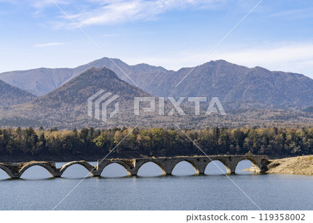 Taushubetsu River Bridge on the former Shihoro Line of the Japanese National Railways on a clear autumn day in Kamishihoro, Hokkaido Taushubetsu River Bridge on the former Shihoro Line of the Japanese National Railways on a clear autumn day in Kamishihoro, Hokkaido 119358002