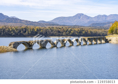 Taushubetsu River Bridge on the former Shihoro Line of the Japanese National Railways on a clear autumn day in Kamishihoro, Hokkaido 119358013
