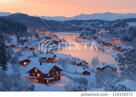 A serene winter lake surrounded by snow-covered cabins, reflecting the warm evening glow A serene winter lake surrounded by snow-covered cabins, reflecting the warm evening glow 119358373