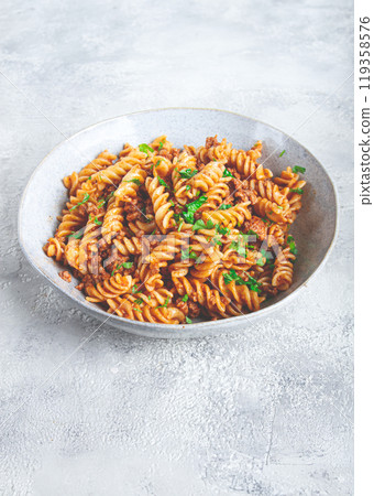 pasta in navy, pasta with minced meat, gray background, homemade, fusilli pasta, no people, pasta in navy, pasta with minced meat, gray background, homemade, fusilli pasta, no people, 119358576
