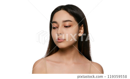 Portrait of beautiful Korean, young girl with brunette hair, well-kept, smooth skin and perfect face shapes, posing isolated on white background. Portrait of beautiful Korean, young girl with brunette hair, well-kept, smooth skin and perfect face shapes, posing isolated on white background. 119359558