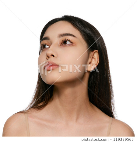 Portrait of beautiful Korean, young girl with brunette hair, well-kept, smooth skin and perfect face shapes, posing isolated on white background. Portrait of beautiful Korean, young girl with brunette hair, well-kept, smooth skin and perfect face shapes, posing isolated on white background. 119359563