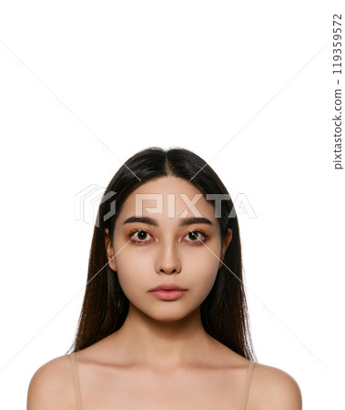 Portrait of beautiful Korean, young girl with brunette hair posing isolated on white background. Looking straight. Face sculpting. 119359572