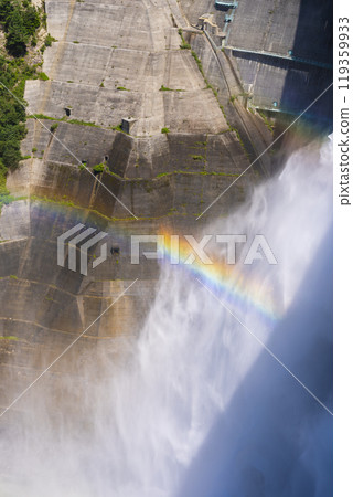 [Vertical photo] A rainbow over the water discharge from Kurobe Dam 119359933