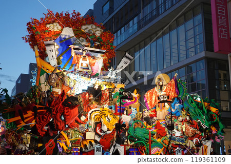 The large floats of the Hachinohe Sansha Taisai, a UNESCO Intangible Cultural Heritage. The impressive carvings and vibrant colors create a captivating scene of this traditional summer festival. The large floats of the Hachinohe Sansha Taisai, a UNESCO Intangible Cultural Heritage. The impressive carvings and vibrant colors create a captivating scene of this traditional summer festival. 119361109