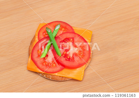 Crispy Cracker Sandwich with Tomato, Cheese and Green Onions Crispy Cracker Sandwich with Tomato, Cheese and Green Onions 119361163