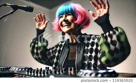old woman with colored hair behind a DJ booth 119363020