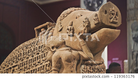Close-up View On Varaha - Colossal Boar Is Third Incarnation Of Lord Vishnu. Varaha Is Depicted As Boar Or In Anthropomorphic Form, With Boar's Head And Human Body. His Consort, Bhumi Is Generally Close-up View On Varaha - Colossal Boar Is Third Incarnation Of Lord Vishnu. Varaha Is Depicted As Boar Or In Anthropomorphic Form, With Boar's Head And Human Body. His Consort, Bhumi Is Generally 119363176