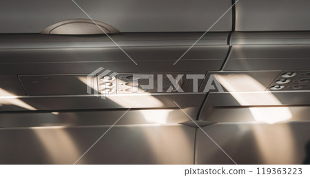 Sun Shining From Airplane Aircraft Plane Window In Cabin Cabin. Shadows moving inside plane cabin during flight. travel trip transportation concept 119363223