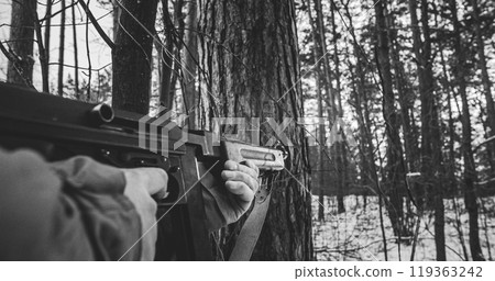 Usa Soldier With Old Thompson Sub-machine Gun. Close-up View Detail On Thompson Sub-machine Gun In Hands Of Re-enactor Dressed As American Infantry Soldier. Usa Army Soldiers Of World War Ii 119363242
