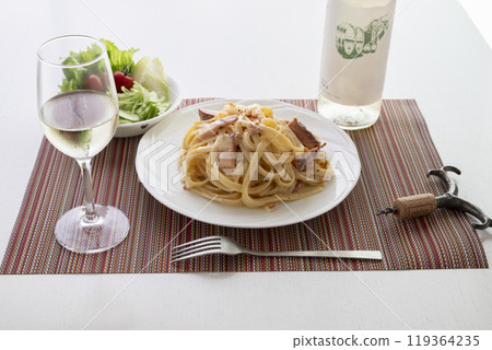 Carbonara and white wine 119364235