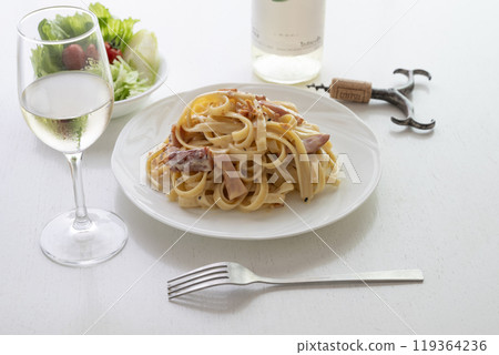 Carbonara and white wine 119364236