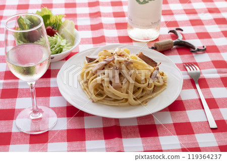 Carbonara and white wine 119364237