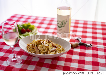 Carbonara and white wine 119364239