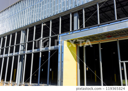 Large commercial buildings are constructed with steel beams profiles Large commercial buildings are constructed with steel beams profiles 119365824