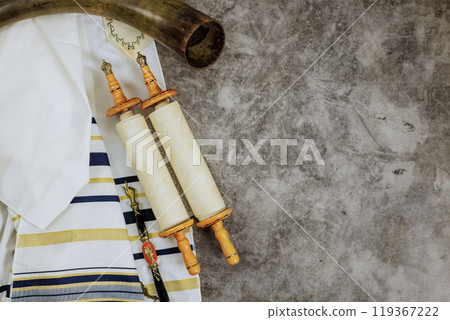 Jews observe religious holidays with use of torah scrolls prayer shawls tallit in synagogues 119367222