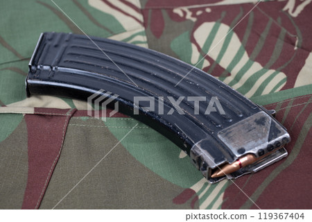 kalashnikov ammunition magazine with cartridges 119367404