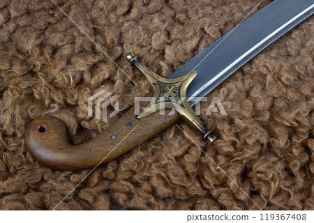 Saber Sword on fur, 17th century. Poland, Lithuania, Hungary, Ukraine. 119367408