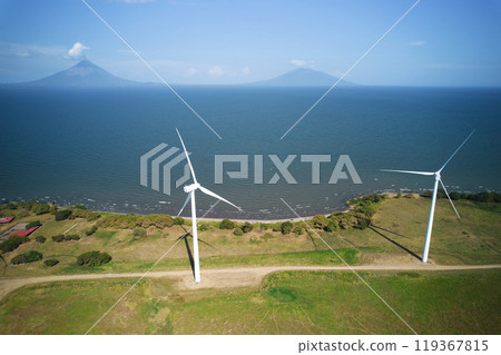 Wind mills on volcano background 119367815