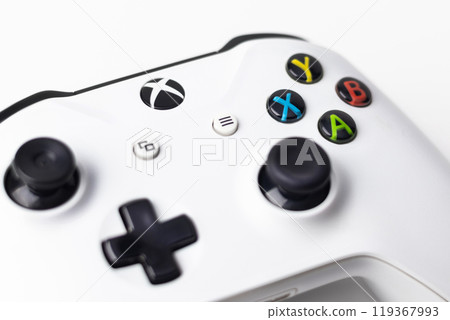 White Xbox One S Controller, Joystick on a white background close up photo White Xbox One S Controller, Joystick on a white background close up photo 119367993