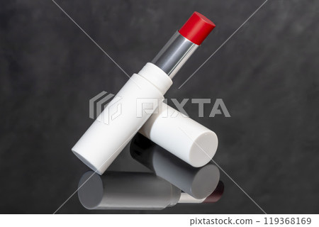 colored lipstick in light tubes. Cosmetic accessories. 119368169