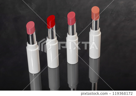 colored lipstick in light tubes. Cosmetic accessories. colored lipstick in light tubes. Cosmetic accessories. 119368172