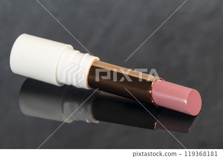 colored lipstick in light tubes. Cosmetic accessories. 119368181