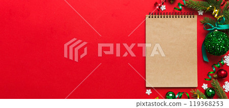 Christmas blank greeting card mock-up scene. Creative layout made of Christmas tree branches and paper card note. Flat lay. Nature New Year concept 119368253