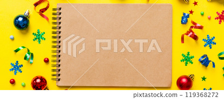 Christmas blank greeting card mock-up scene. Creative layout made of Christmas toy and paper card note. Flat lay. Nature New Year concept Christmas blank greeting card mock-up scene. Creative layout made of Christmas toy and paper card note. Flat lay. Nature New Year concept 119368272