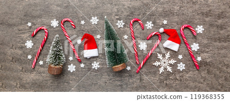 Flat lay composition with christmas trees on color background. Top view with copy space Flat lay composition with christmas trees on color background. Top view with copy space 119368355
