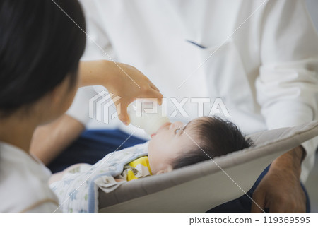 Baby sleeping in bouncer Baby sleeping in bouncer 119369595