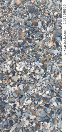Sea pebbles background close up. South Turkey. Alanya, Antalya. Mediterranean Sea Sea pebbles background close up. South Turkey. Alanya, Antalya. Mediterranean Sea 119369996