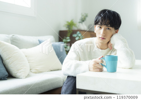 Man drinking coffee Man drinking coffee 119370009
