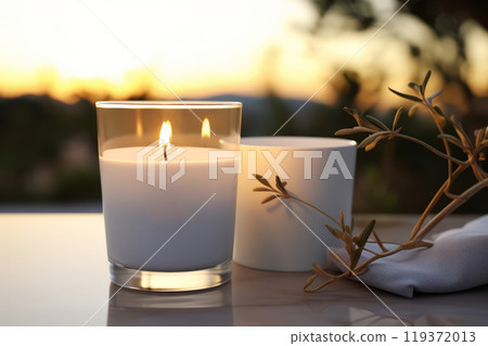 Minimalist candle scene at sunset with olive branch decor, perfect for relaxation, spa concepts, or evening rituals Minimalist candle scene at sunset with olive branch decor, perfect for relaxation, spa concepts, or evening rituals 119372013