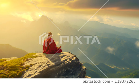 A monk meditating on top of a mountain, symbolizing the purification of the mind 119372263