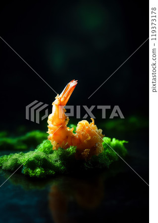 fried crispy shrimp on a wooden table with wasabi on a dark background 119373178
