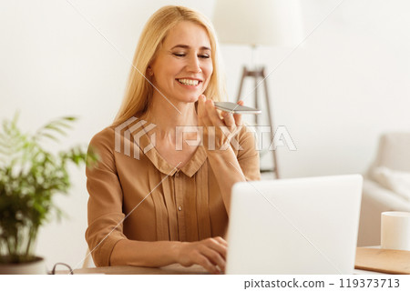 Audio Message. Woman Using Phone, Working On Laptop In Office 119373713