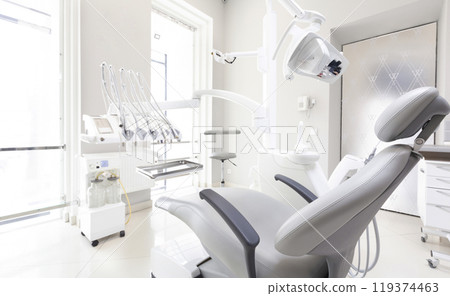 Dentist tools and professional dentistry chair in modern clinic, orthodontist room, copy space 119374463