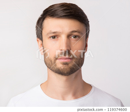 Passport Photo. Portrait Of Middle Aged Man Looking At Camera Over White Studio Background. Isolated Passport Photo. Portrait Of Middle Aged Man Looking At Camera Over White Studio Background. Isolated 119374600