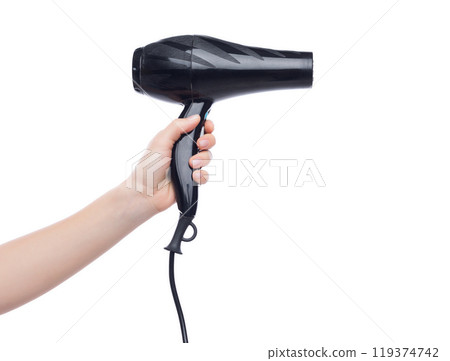 Female hand holding professional hair dryer isolated on white background. Salon equipment, cutout 119374742