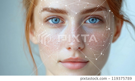 A young woman with striking blue eyes and freckles showcases facial recognition technology in a bright indoor setting. 119375789