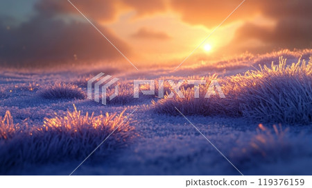 A tranquil winter landscape features frost-covered grass reflecting the warm hues of a vibrant sunrise. The soft light casts a magical glow, creating a peaceful atmosphere filled with beauty. A tranquil winter landscape features frost-covered grass reflecting the warm hues of a vibrant sunrise. The soft light casts a magical glow, creating a peaceful atmosphere filled with beauty. 119376159