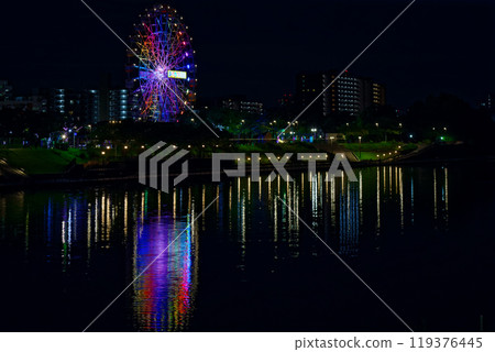 Arakawa Amusement Park's Ferris wheel and the scenery reflected in the Sumida River, night view, illuminated Arakawa Amusement Park's Ferris wheel and the scenery reflected in the Sumida River, night view, illuminated 119376445