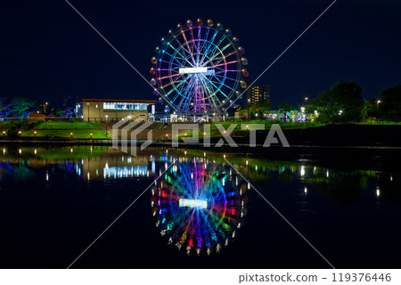 Arakawa Amusement Park's Ferris wheel and the scenery reflected in the Sumida River, night view, illuminated Arakawa Amusement Park's Ferris wheel and the scenery reflected in the Sumida River, night view, illuminated 119376446