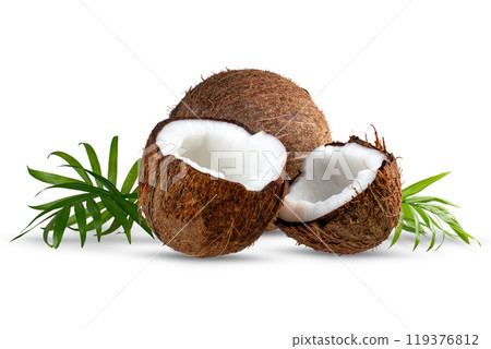 Ripe broken fresh coconut with green leaves on white background, isolate. Ripe broken fresh coconut with green leaves on white background, isolate. 119376812