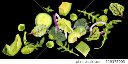 Vegetable salad isolated, falling rucola, lettuce, spinach leaves, sliced vegetables isolated on black background 119377003