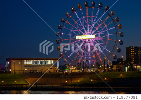 Arakawa Amusement Park's Ferris wheel and the scenery reflected in the Sumida River, night view, illuminated Arakawa Amusement Park's Ferris wheel and the scenery reflected in the Sumida River, night view, illuminated 119377081