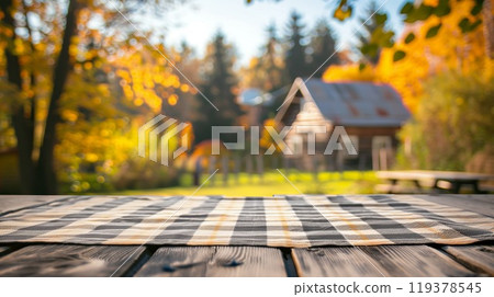 Empty wooden table with tablecloth in the autumn garden. Copy space. Generative AI Empty wooden table with tablecloth in the autumn garden. Copy space. Generative AI 119378545